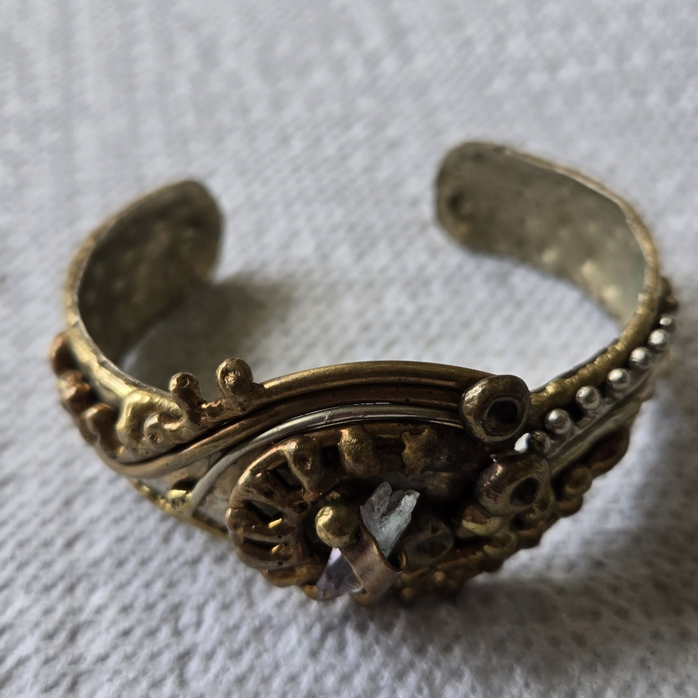 Vintage cuff Bracelet "Hecho En Mexico" It's a Sterling silver with a brass Acce